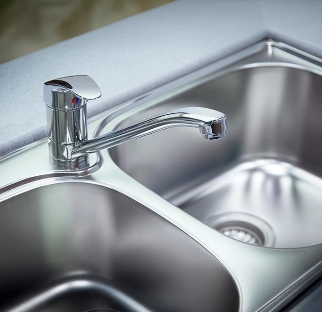 Stainless steel double sink.