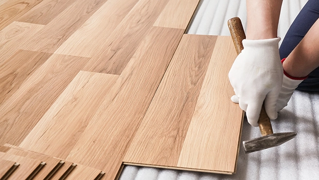 Fitting a wood floor.
