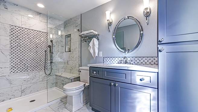 Marble bathroom featuring large shower.