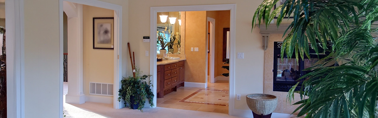 Wide view of interior showcasing bathroom.