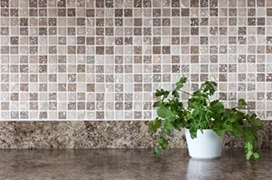Countertop with tile backsplash.