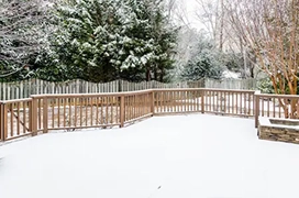 Snow covered deck.