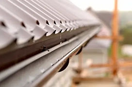 Up close visual of roof gutter.