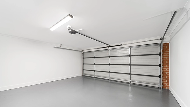 A picture of a garage floor painted gray.