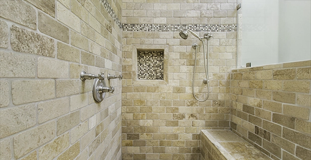 A picture of a walk in shower with tile.
