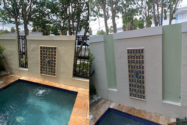 mental fence near pool waterfall