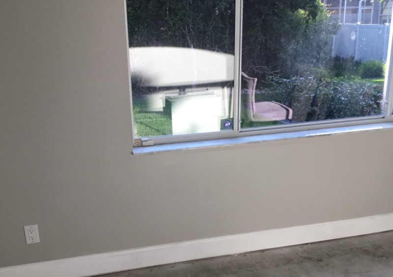 Drywall repair on a bedroom wall.