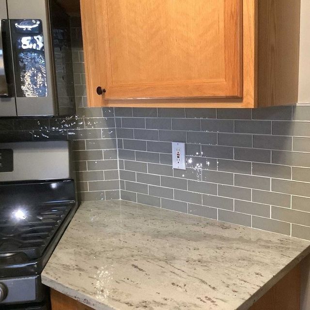 Grey tile backsplash in kitchen