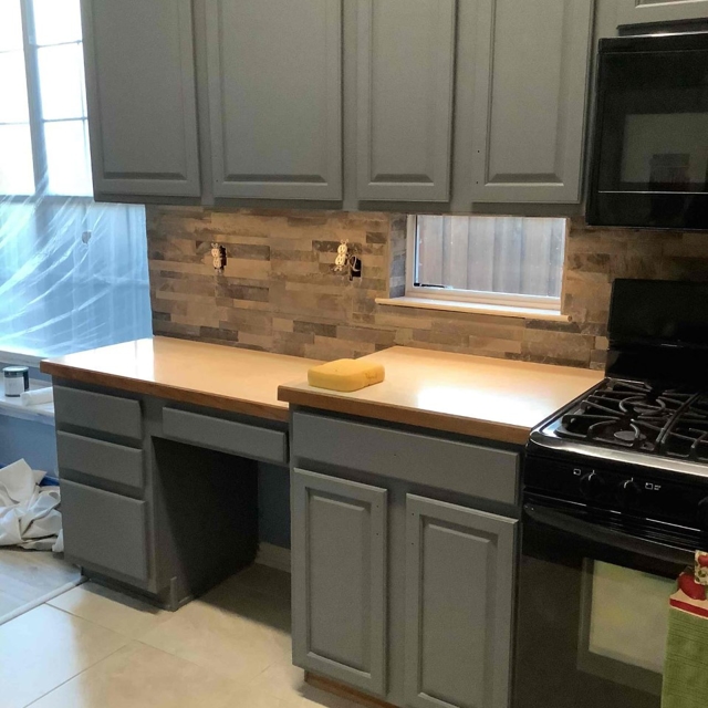 New tan kitchen backsplash.