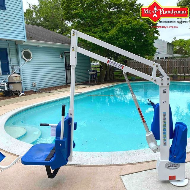 pool lift installed in backyard for pool accessibility