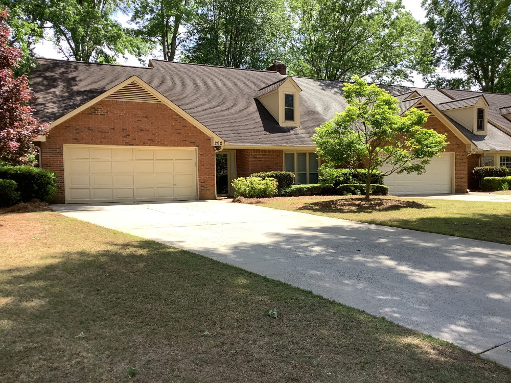 Pressure wash driveway and walkway to front door