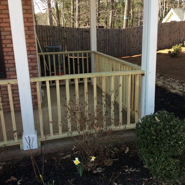 Replaced front porch handrail and pickets.