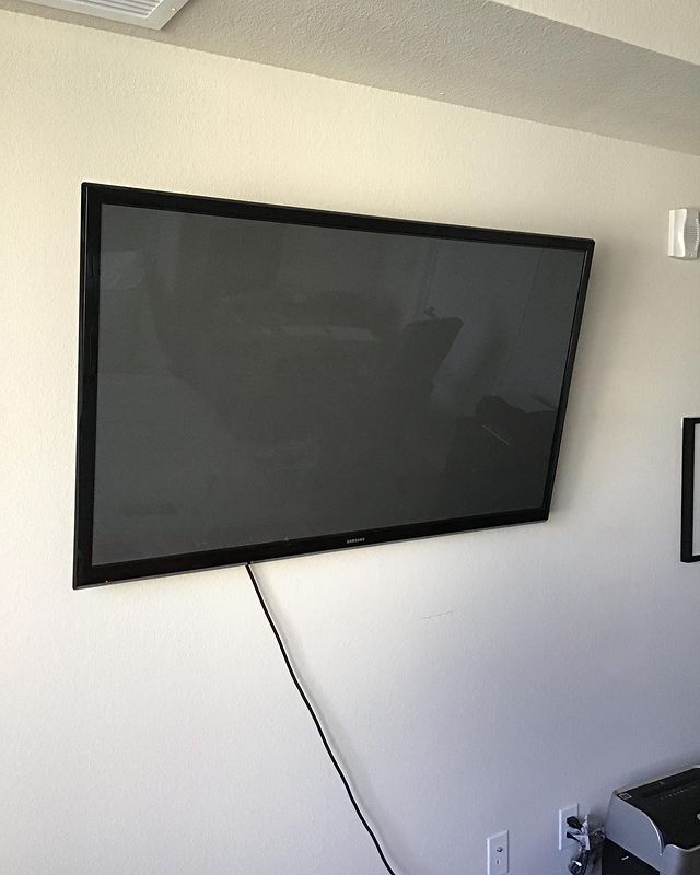 flat screen tv mounted on wall