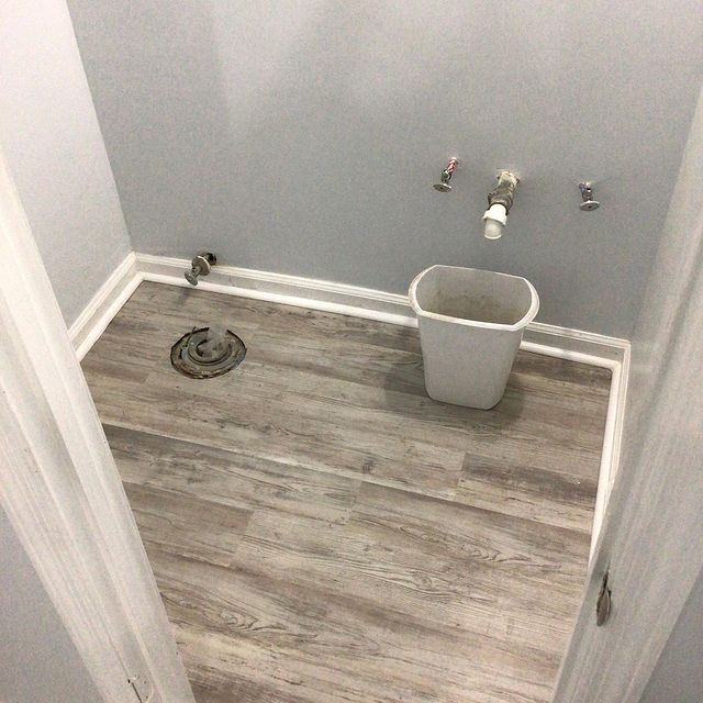Wood floor installation in bathroom