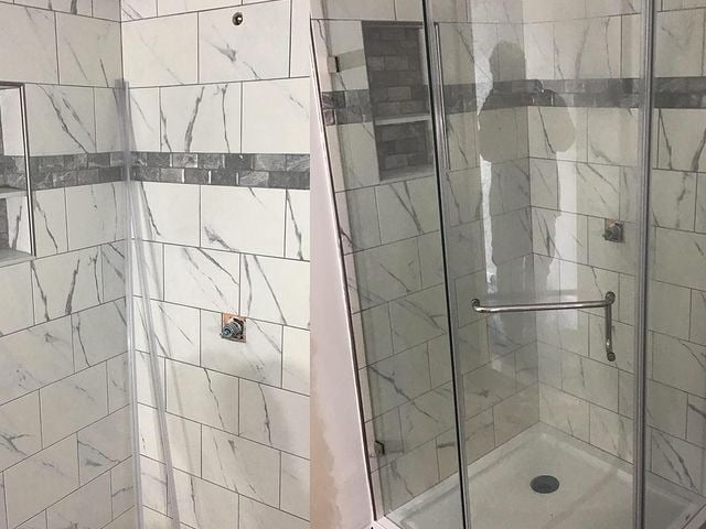 This is a shower installation of a glass door and walls.
