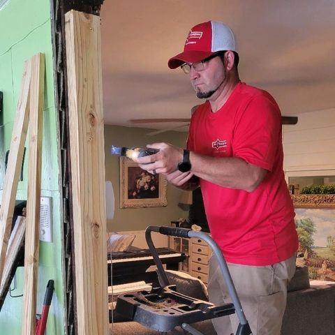 Our technician Josh is working hard to replace a door for our customer