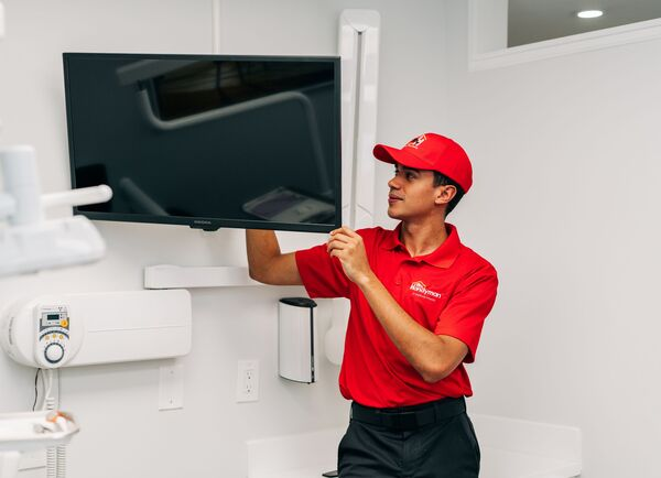 Commercial monitor installation by a professional from Mr. Handyman (Carol Stream, IL).