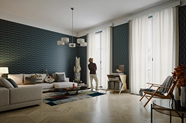 A Man in a house living area.