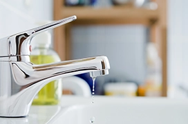 Close-up of leaking tap.