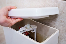 Close-up of toilet tank.