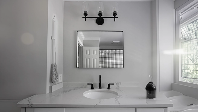 Modern bathroom with a sleek marble countertop.