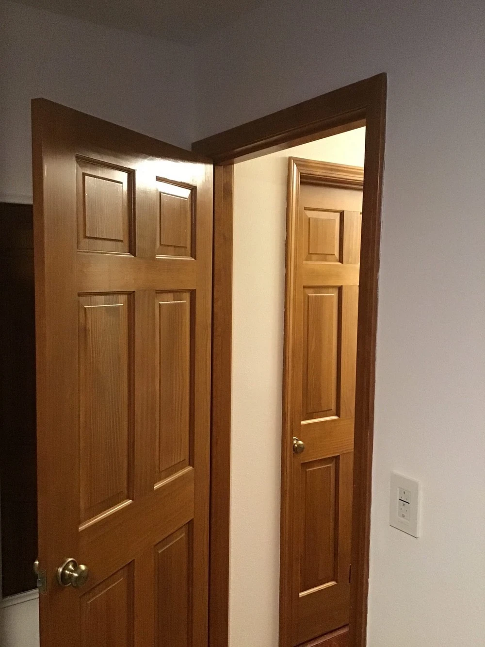 A wooden door installed in a home with Mr. Handyman&rsquo;s services for door installation in Collinsville, IL.
