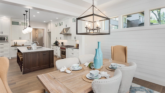 A modern kitchen and dining area.