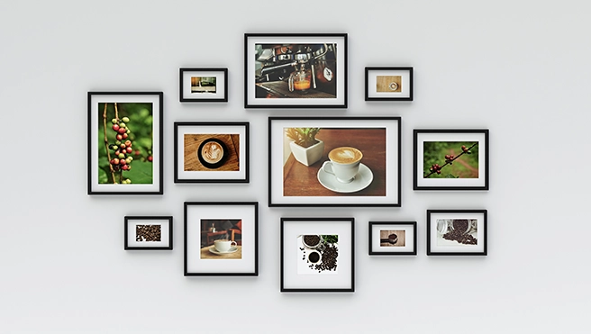 A gallery wall featuring various framed images.