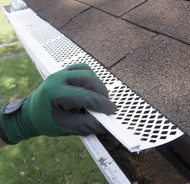Plastic gutter guard.