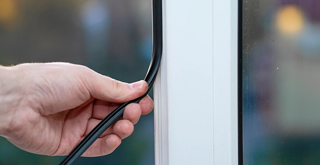 Installing window beading.