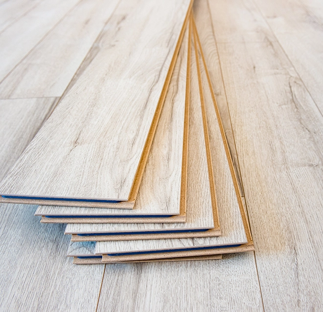 Stack of floor planks ready for installation.