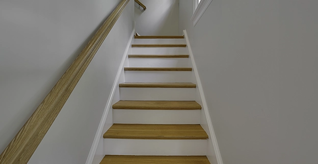 A wooden staircase leading upward.