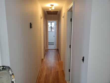 Hallway with wooden floors