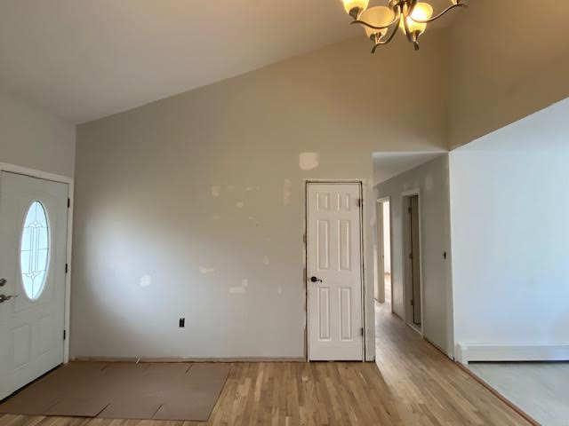 Home entry way with hardwood floors