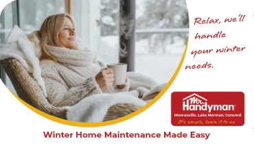 Woman relaxing indoors with a hot drink on a snowy day.