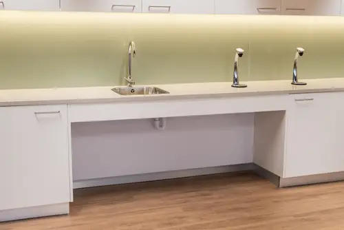 Wheelchair accessible kitchen with shallow depth sink