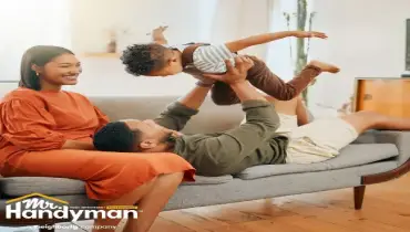 Family relaxing together in a refreshed and comfortable living room after early-year home improvements in Easton, PA.