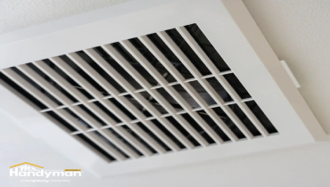 A ceiling air return vent.