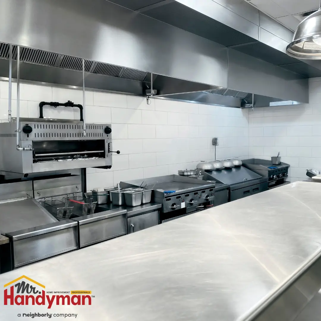 A commercial kitchen featuring stainless steel equipments.