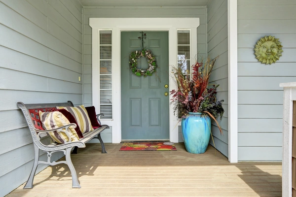 Green front door installation in Florida.
