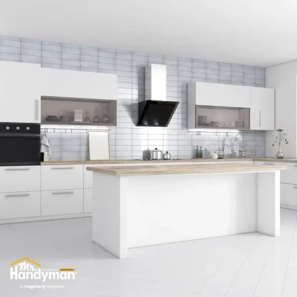 handyman reviewing flooring and countertop samples in Oklahoma City OK home