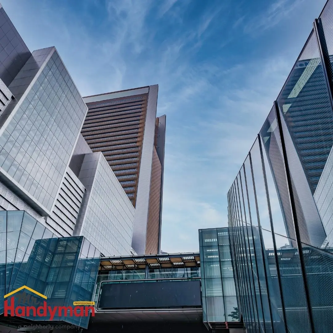A cityscape with a group of tall buildings.