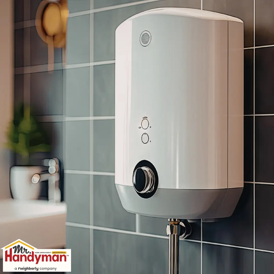 White electric water heater mounted on a gray tiled bathroom.