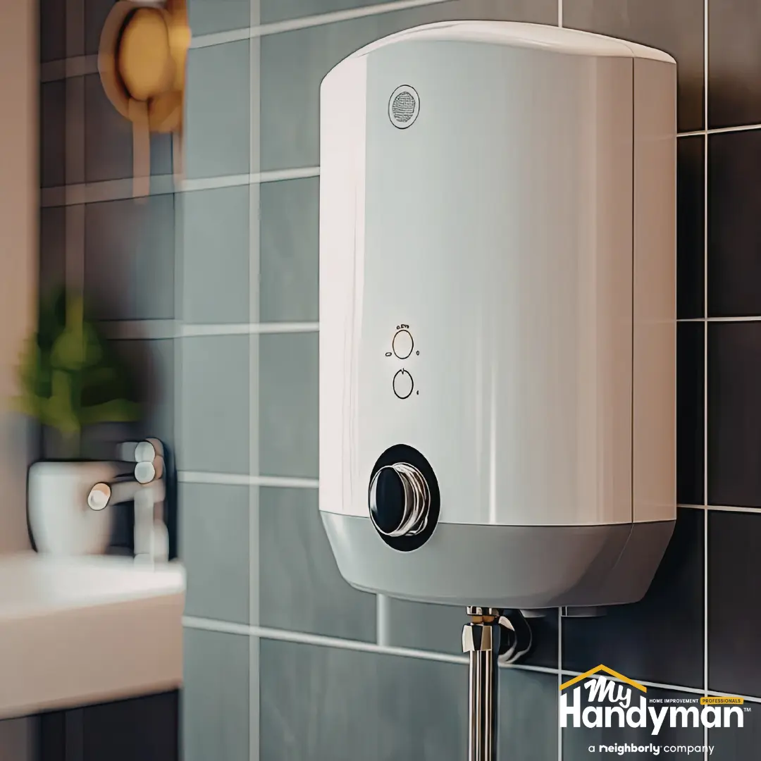 Handyman installing a new bathroom faucet in a home in Rock Hill South Carolina