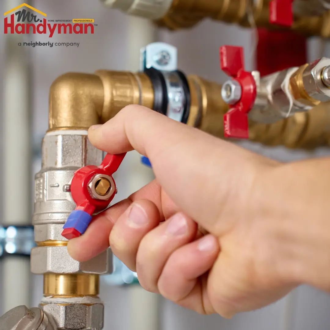Mr. Handyman technician testing water pressure