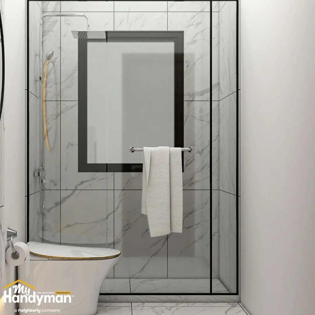 White toilet with a modern shower.