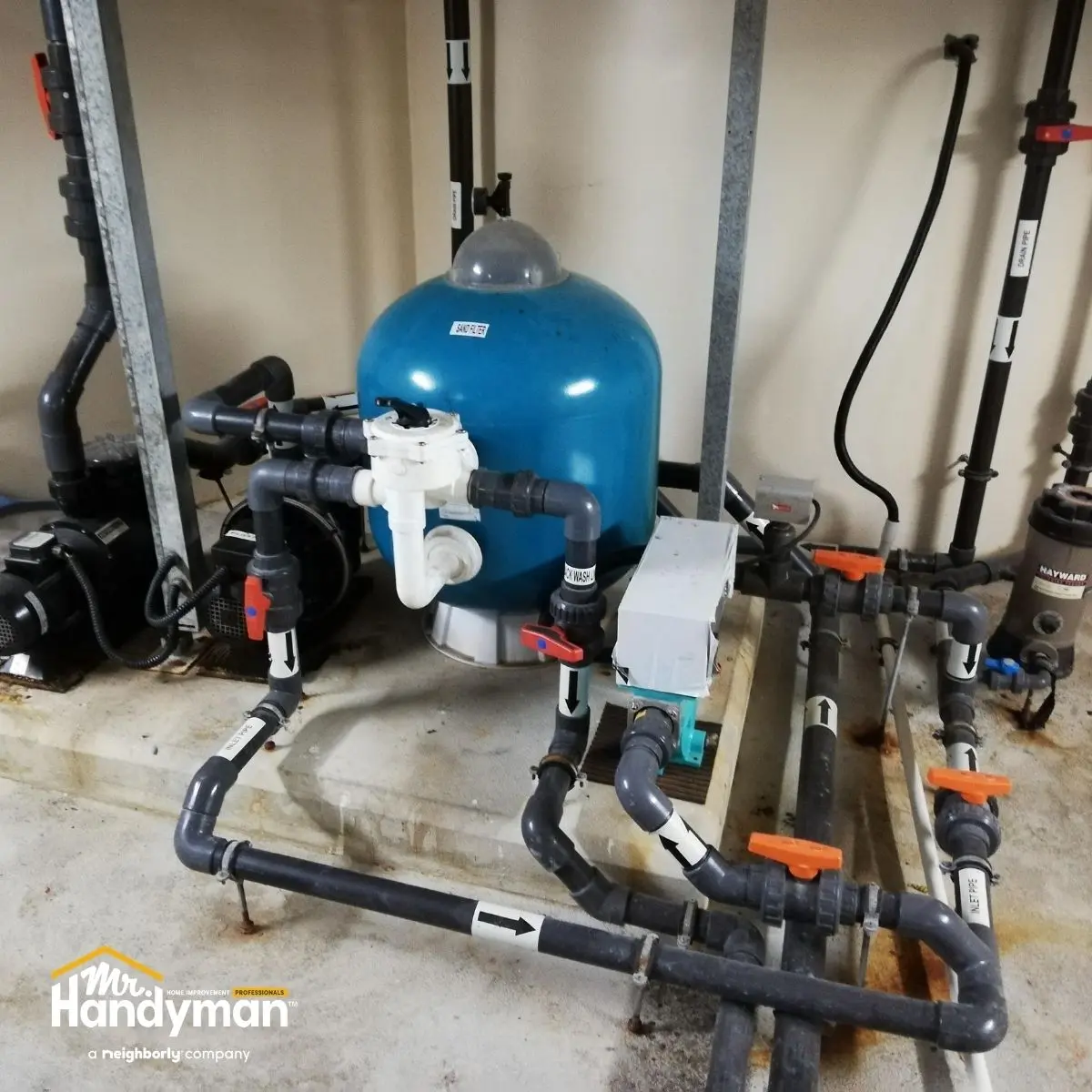 Mr. Handyman technician performing spring commercial property maintenance inspection in Wichita