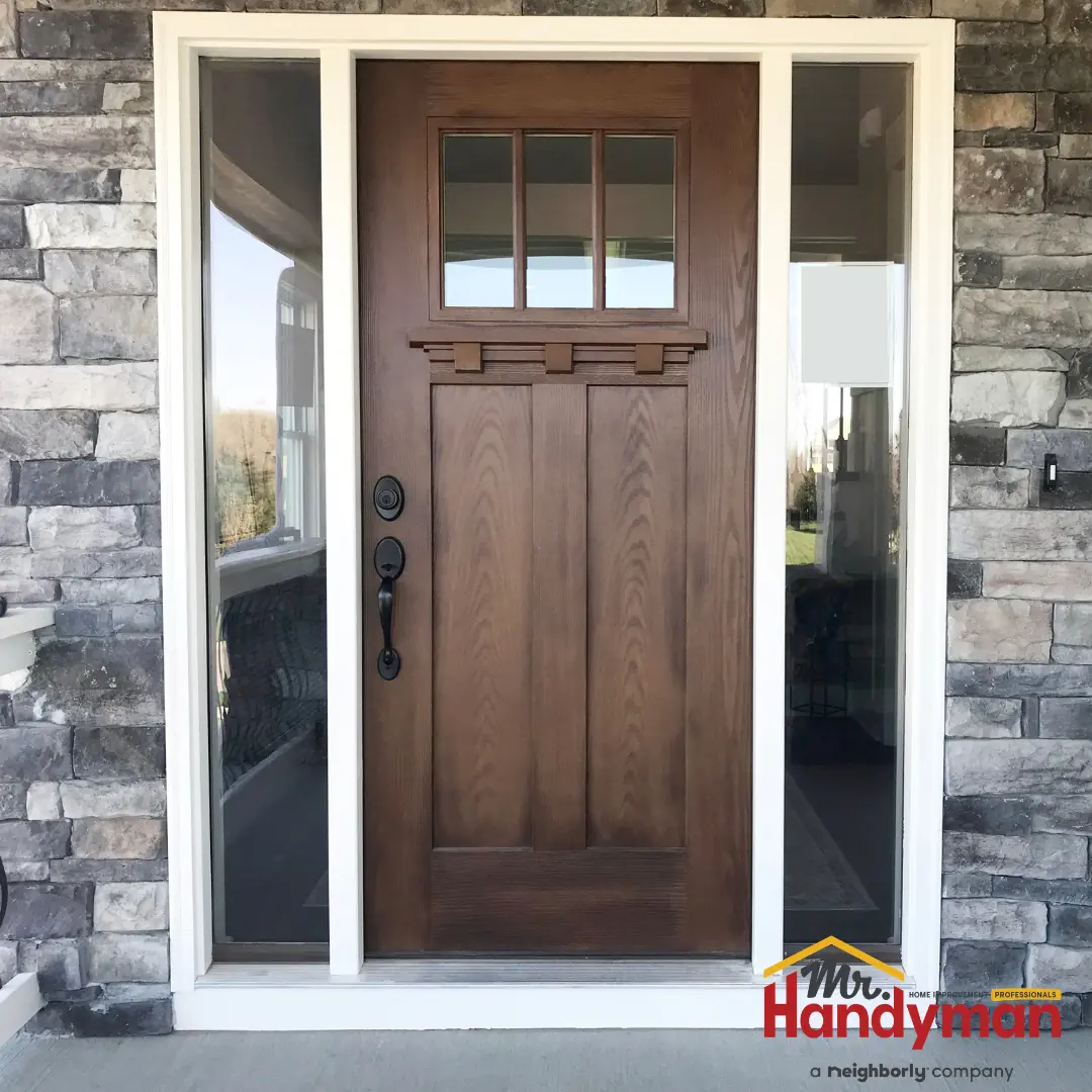 Handyman installing a replacement window in a Mishawaka, IN home