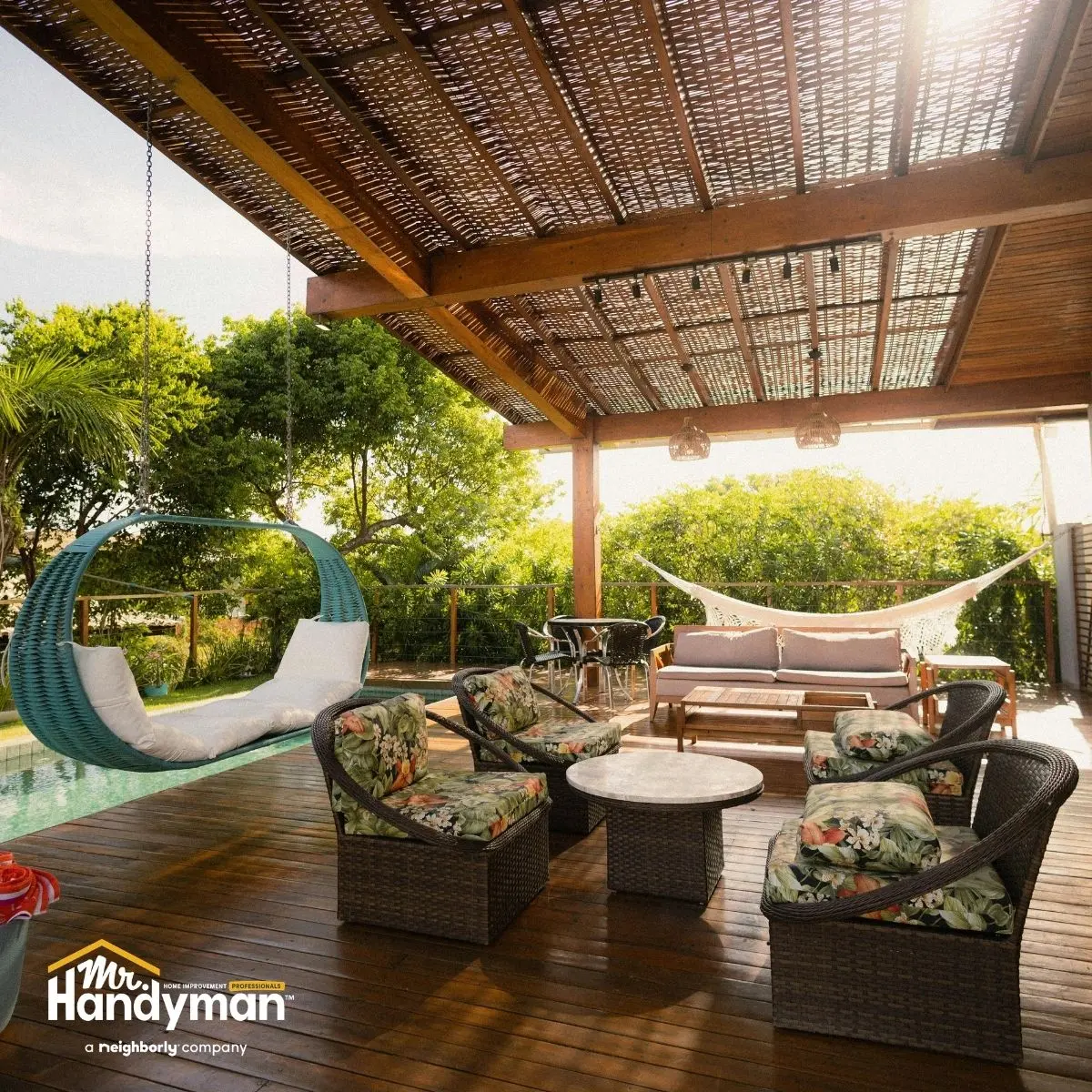 Mr. Handyman technician building outdoor deck and pergola at Montgomery County MD home in spring