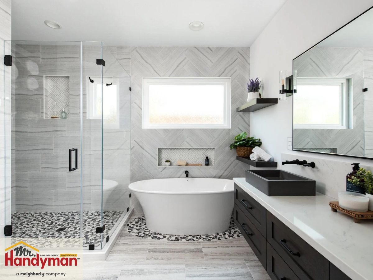 Updated bathtub in a modern Clearwater bathroom with refinished surface and new fixtures